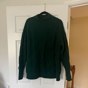 Green textured sweater